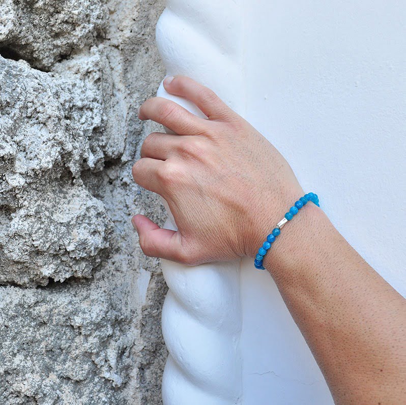 Handmade bracelet with blue jadeite tag and silver twisted sarnier.