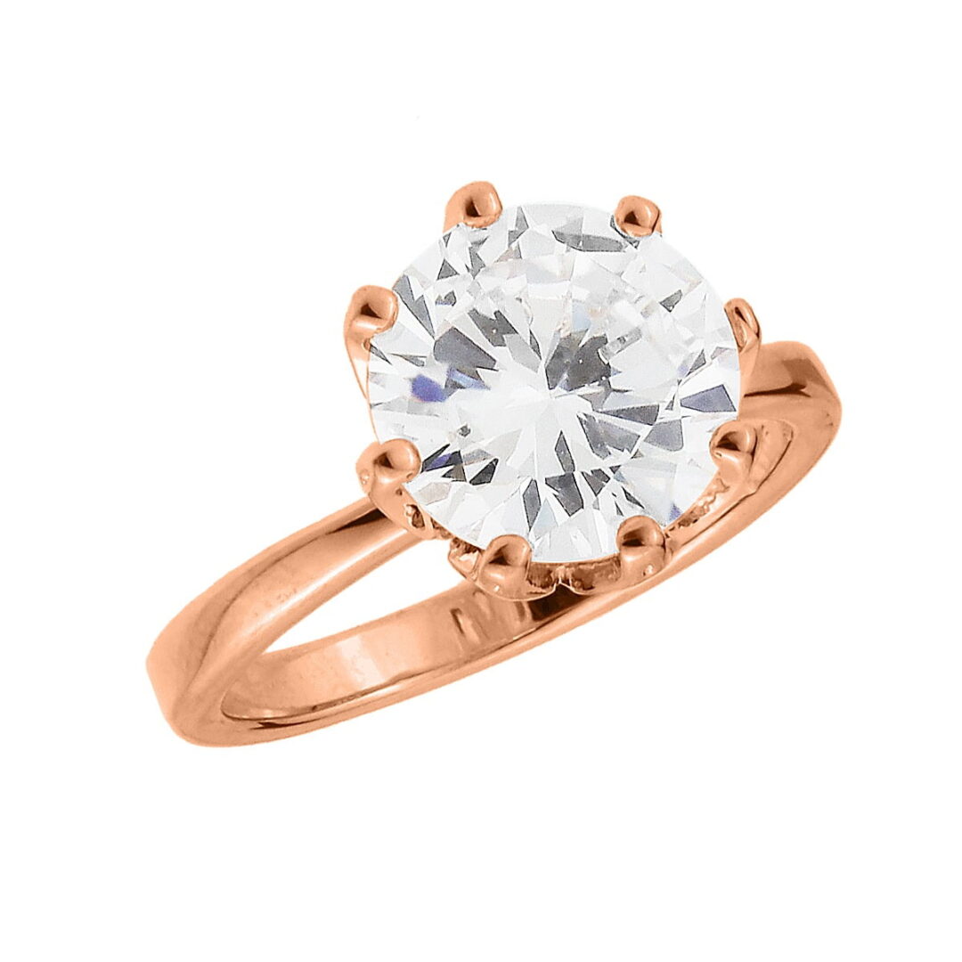 Solitaire ring in Silver 925, in pink colour, with a round large cubic zirconia with a water lily base.