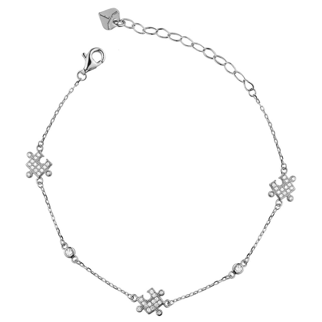 Bracelet of silver 925° with Puzzle pieces decorated with white zircons, and decorative solitaire zircons.